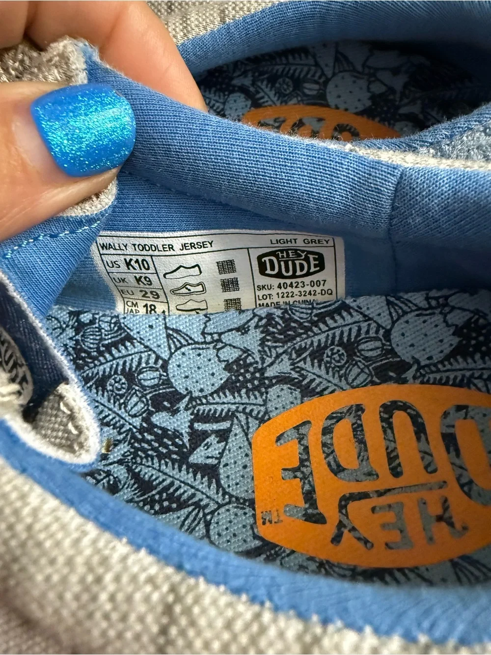 Hey Dude Kids Slip-On Moccasins in Beige with Blue Lining and Orange Accents